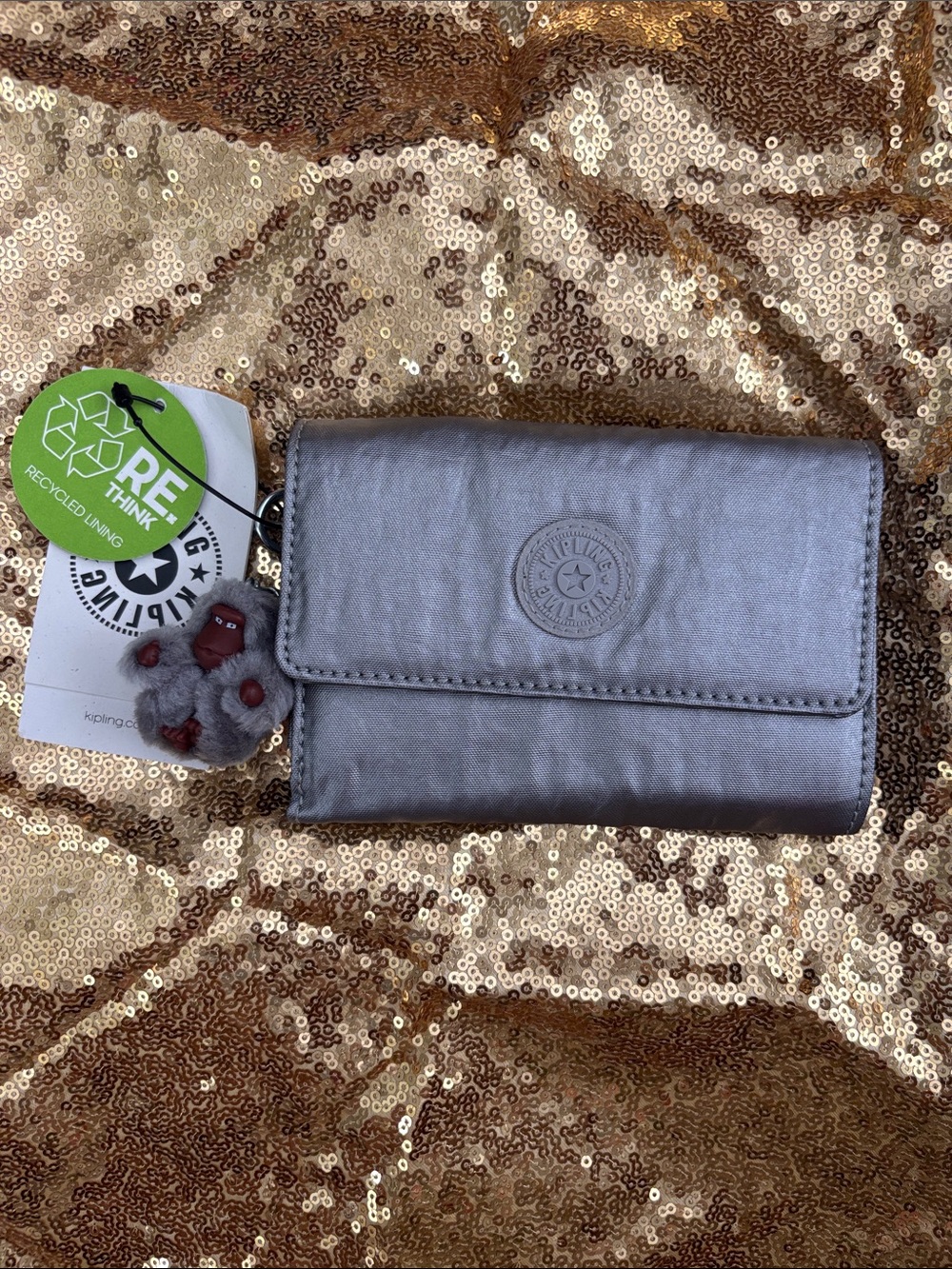 Kipling Metallic Silver Compact Trifold Wallet with Monkey Keychain